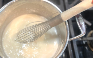 grits with whisk